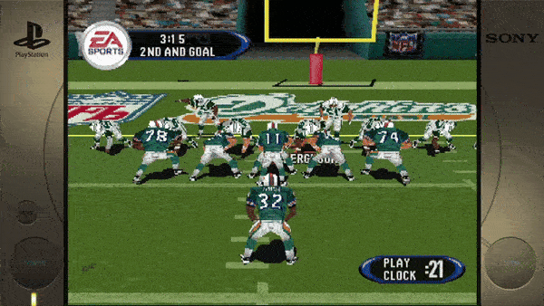 **Left Side:** - PlayStation (logo) **Center (Game Screen):** - EA SPORTS (logo) - 3:15 - 2ND AND GOAL - NFL (logo) on the field - DOLPHINS (logo on the field) - PLAY CLOCK 21 **Right Side:** - SONY