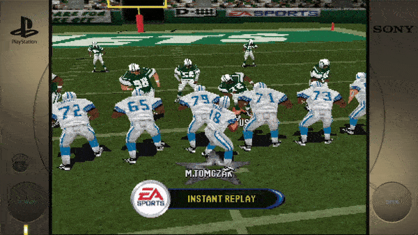 Here's the text from the image: "M.TOMCZAK EA SPORTS INSTANT REPLAY"