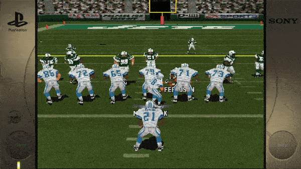 The visible text in the image includes: - "PlayStation" (on the left) - "SONY" (on the right) - "F E" (Partially visible text in the middle, likely part of "OFFENSE") - Some numbers on jerseys, e.g., "79," "72," "65," "71," "86," "90," "37," "21" - "MACK" (on the player's jersey with number "21")