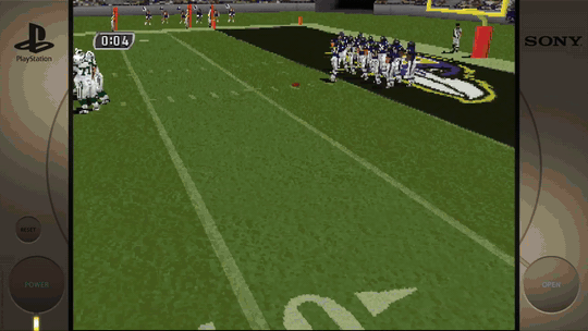 Curtis Martin scores on a three-yard touchdown run for his third of the game